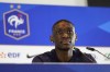 France's Randal Kolo Muani gestures as he speaks during a press conference in Paderborn, Germany, Sunday, July 7, 2024. France will play against Spain during their semifinal soccer match at the Euro 2024 soccer tournament on July 9. (AP Photo/Hassan Ammar)