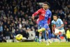 FILE - Crystal Palace's Michael Olise shoots a penalty kick to score during the English Premier League soccer match between Manchester City and Crystal Palace at the Etihad Stadium in Manchester, England, Dec.16, 2023. Bayern Munich signed Olise on Sunday, July 7, 2024 in a search for “new ideas” after its first season without a trophy in 12 years. (AP Photo/Dave Thompson, file)