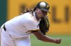 Pittsburgh Pirates starting pitcher Luis L. Ortiz delivers during the first inning of a baseball game against the New York Mets in Pittsburgh, Sunday, July 7, 2024. (AP Photo/Gene J. Puskar)