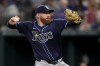 Tampa Bay Rays starting pitcher Zack Littell throws to the Texas Rangers in the fourth inning of a baseball game in Arlington, Texas, Sunday, July 7, 2024. (AP Photo/Tony Gutierrez)