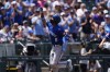 Kansas City Royals' Maikel Garcia gestures as he circles the bases after hitting a three-run home run off Colorado Rockies starting pitcher Tanner Gordon in the second inning of a baseball game Sunday, July 7, 2024, in Denver. (AP Photo/David Zalubowski)