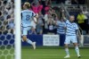 Sporting Kansas City midfielder Memo Rodríguez (8) celebrates after scoring a goal during the second half of an MLS soccer match against FC DallasSunday, July 7, 2024, in Kansas City, Kan. Sporting Kansas City won 3-2. (AP Photo/Charlie Riedel)