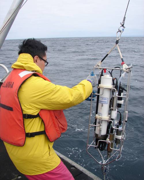 Matt Robart / Oregon State University
                                In this 2006 photo, a researcher drops a device into the Pacific Ocean near Oregon to measure how much oxygen is in the water in search 
of dead zones, areas of an ocean devoid of marine life. Over 700 such dead zones exist.