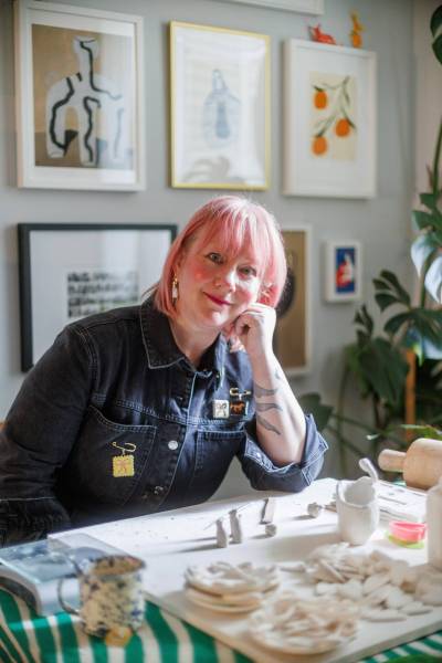 MIKE DEAL / FREE PRESS
                                Meghan Greenlay has dedicated hours at the potter’s wheel honing her craft.
