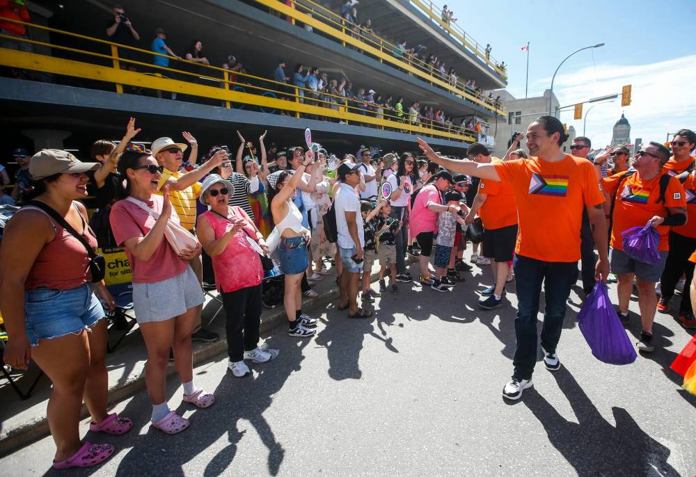 JOHN WOODS / FREE PRESS People attend the pride parade