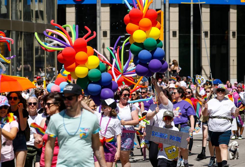 JOHN WOODS / FREE PRESS People attend the pride parade
