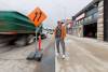 MIKE DEAL / FREE PRESS Mel Mozel, owner of Bodyshades (893 Portage Ave), learned there’d be construction in front of his bar / cafe / tanning salon because he asked a construction worker as they were putting up a sign.