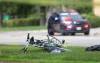 Ruth Bonneville / Free Press Local - Cyclist hit Police investigate the scene of a cyclist accident along Wellington Crescent between Hugo Ave. and Dorchester street Thursday. A mangled bike lays on the boulevard on the south side of Wellington Crescent, just east of Cockburn Street. The crescent remains closed as Investigators set up markers to retrace the accident. June 6th, 2024