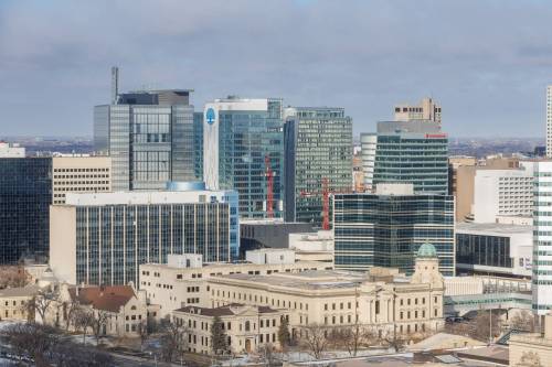 MIKE DEAL / WINNIPEG FREE PRESS A view of downtown Winnipeg from the roof of 7 Evergreen Place. 240202 - Friday, February 02, 2024.