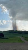 A suspected tornado touches down near Bruxelles, southeast of Brandon early Wednesday evening. (Jennifer Dalgleish/Facebook)