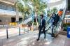 MIKAELA MACKENZIE / FREE PRESS
                                Health Minister Uzoma Asagwara walks through Portage Place after a news conference announced new redevelopment details for the space on April 5.