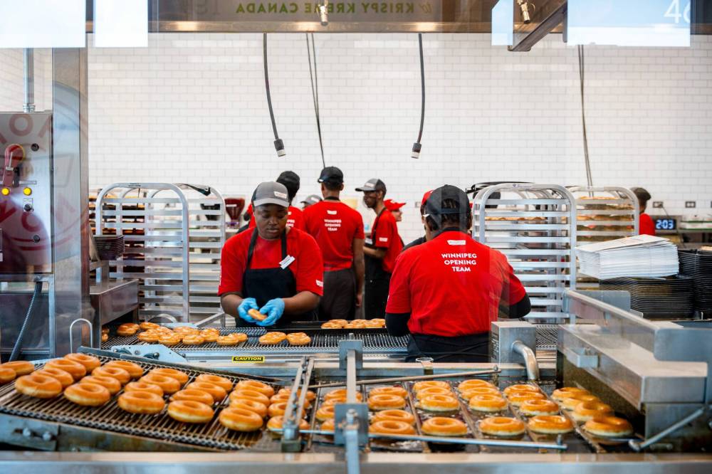 NIC ADAM / FREE PRESS
                                Krispy Kreme has the capacity to churn out about 50,000 doughnuts a day.