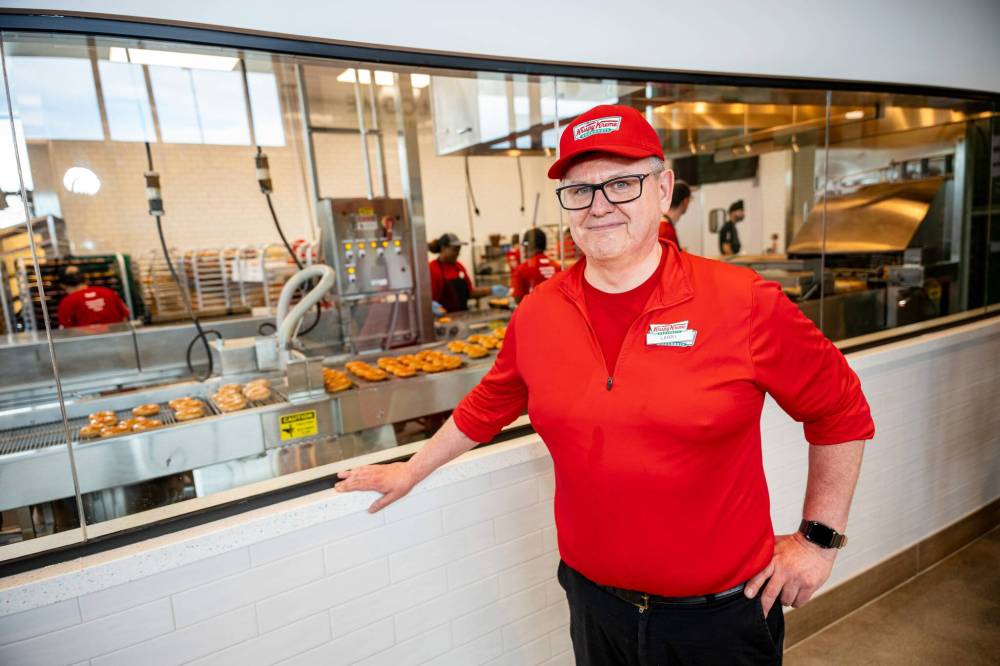 NIC ADAM / FREE PRESS
                                Krispy Kreme general manager Larry Geraghty is ready to turn the Hot Light on.