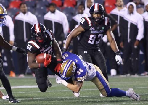 Patrick Doyle / THE CANADIAN PRESS
                                Winnipeg Blue Bombers&rsquo; Bailey Feltmate (36) tackles Ottawa Redblacks&rsquo; DeVonte Dedmon (17) during first half CFL action in Ottawa on Thursday, June 13, 2024.