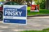 NIC ADAM / FREE PRESS
                                Elections signs along Grenfell Blvd. in Tuxedo June 13.