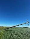 A toppled Hydro pole in western Manitoba on Sunday. (Manitoba Hydro)