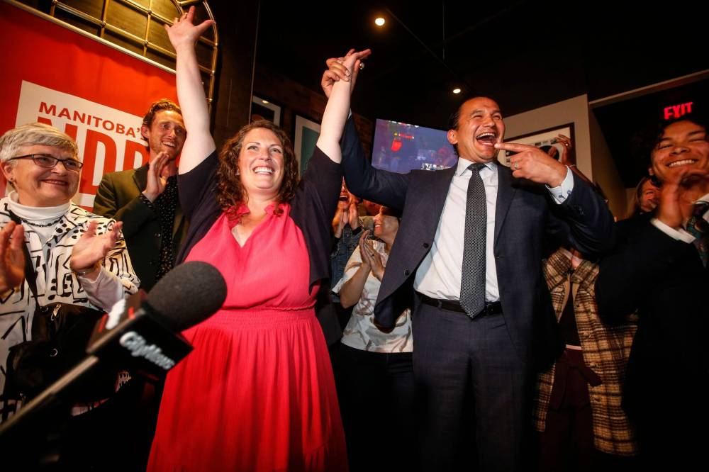 JOHN WOODS / FREE PRESS
Carla Compton and Premier Wab Kinew celebrate Compton’s win in Tuxedo’s byelection Tuesday.