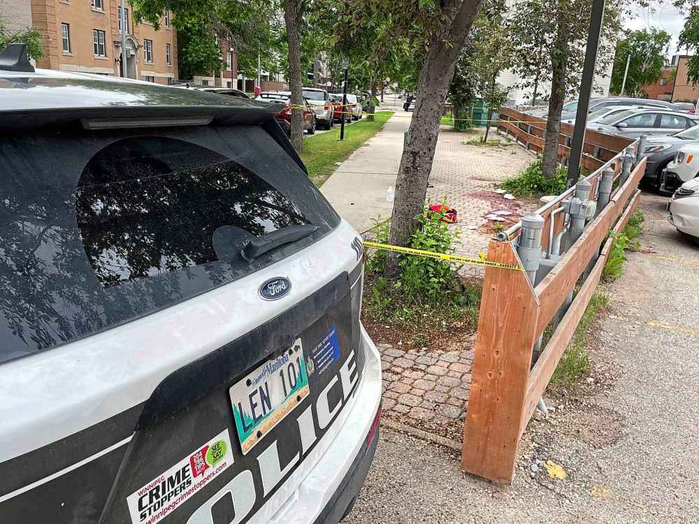 Police found a man, believed to be in his 20s, suffering serious injuries near Central Park Tuesday. (Ruth Bonneville / Free Press)