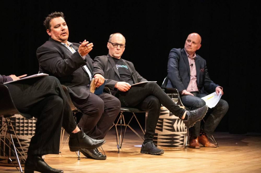 MIKAELA MACKENZIE / FREE PRESS
Winnipeg Free Press columnist Niigaan Sinclair (left), Stephen Borys, director and CEO of WAG-Qaumajuq and Free Press editor Paul Samyn discuss reconciliation Wednesday at the art gallery.