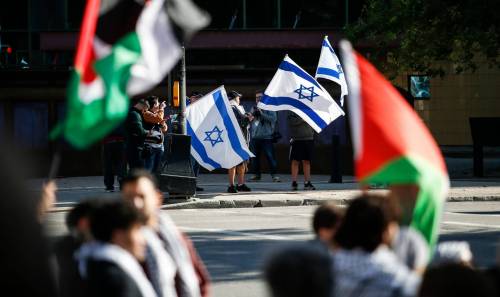 JOHN WOODS / FREE PRESS FILES
                                About 150 Palestinian supporters rally outside City Hall and throughout the Exchange District as six Israel supporters gather on the opposite side of Main Street in October 2023.