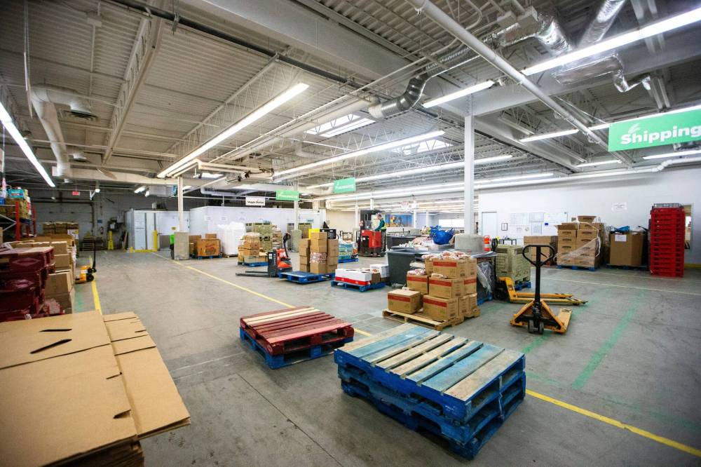 MIKAELA MACKENZIE / FREE PRESS FILE Harvest Manitoba, the province’s largest food bank is hoping a new computer system will reduce waste and help get food more efficiently to the people who need it.