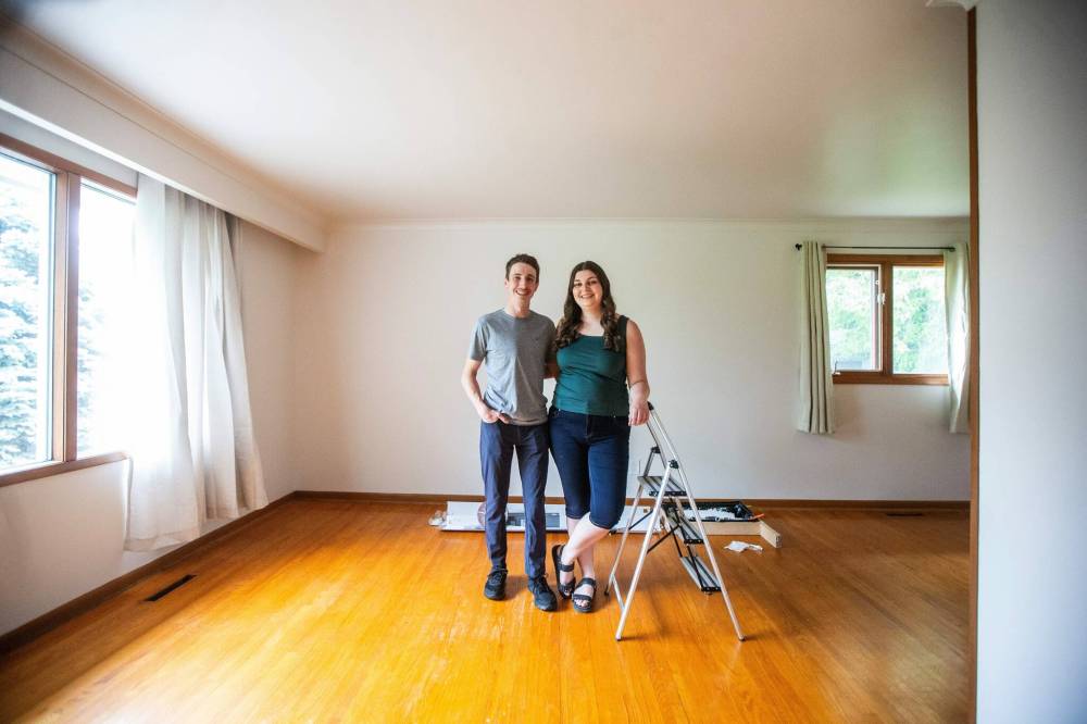 MIKAELA MACKENZIE / FREE PRESS First-time home buyers Taylor Sumner and Evan Boychuk with their house, which they took posession of three weeks ago, on Friday, June 21, 2024. In a hot housing market with bidding wars now the norm, they managed to find this diamond in the rough and paid under asking price. For Josh story.
MIKAELA MACKENZIE / FREE PRESS First-time home buyers Taylor Sumner and Evan Boychuk with their house, which they took posession of three weeks ago, on Friday, June 21, 2024. In a hot housing market with bidding wars now the norm, they managed to find this diamond in the rough and paid under asking price. For Josh story.