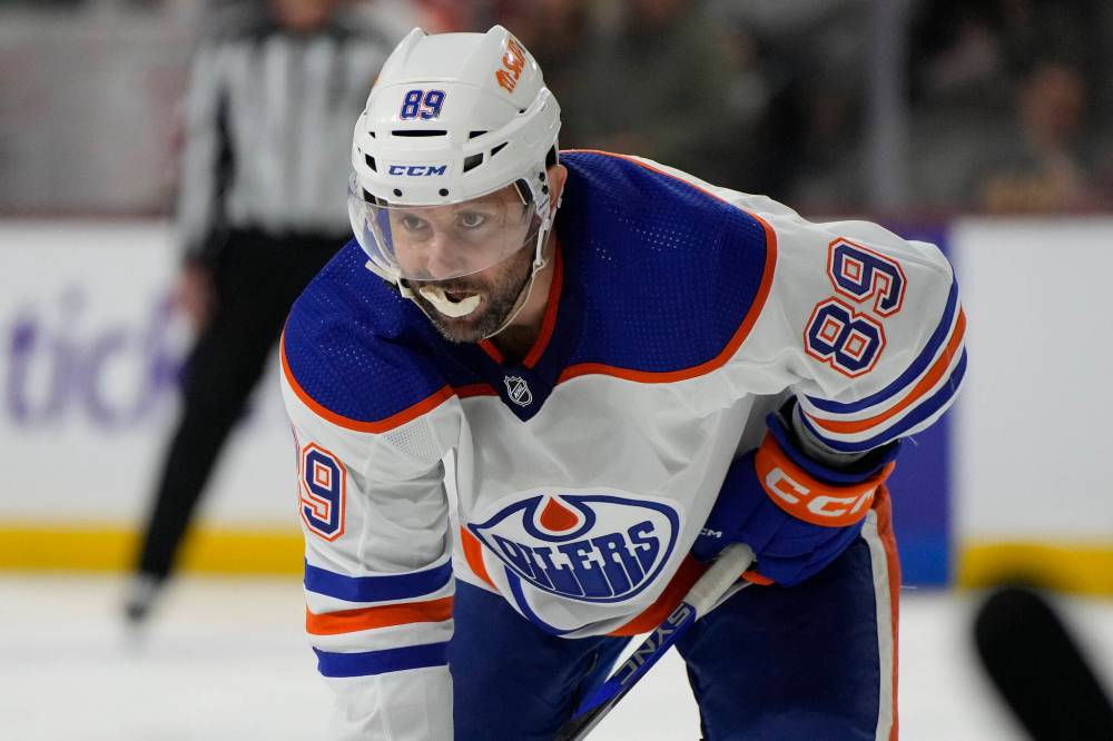 RICK SCUTERI / THE ASSOCIATED PRESS FILES
Edmonton Oilers centre Sam Gagner hasn’t seen any ice time during the playoffs, so he makes his contributions in other ways.