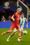 Mike Stewart / The Associated Press
                                Canada’s Liam Millar (left) and Argentina’s Rodrigo De Paul in action Thursday night in Atlanta.