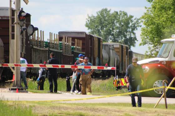 Firefighters were taking part in the event when they were called to the collision. They were also guiding residents and students to mental health supports. (Chris Gareau / The Carillon)