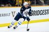 Dylan DeMelo and the Winnipeg Jets have agreed to a four-year contract extension which includes an average annual value of $4.9 million. (Mark Zaleski / The Associated Press files)