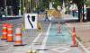 MIKE DEAL / FREE PRESS FILES The city will explore contracting out part of its road-marking operation after significantly falling behind this year due to outdated equipment and a high number of rainy days.