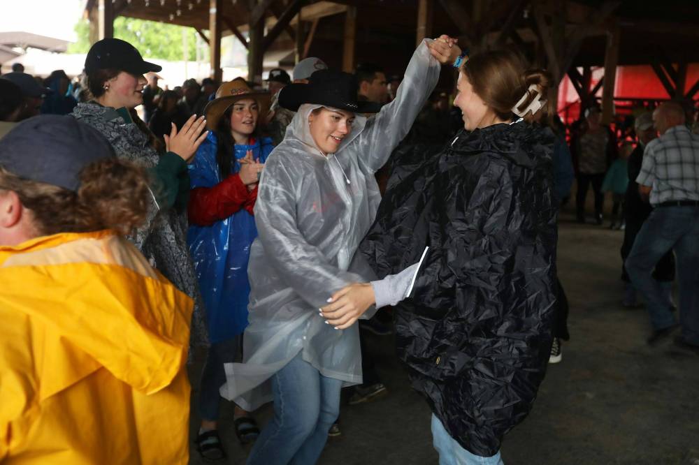 TIM SMITH / THE BRANDON SUN Festivalgoers dance to the music of Quinton Blair.