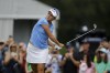 Lexi Thompson watches her tee shot on the fourth hole during the first round of the Dow Championship LPGA golf tournament, Thursday, June 27, 2024, at Midland Country Club in Midland, Mich. (AP Photo/Al Goldis)