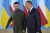 Poland's Prime Minister Donald Tusk, right, and Ukrainian President Volodymyr Zelenskyy walk during their meeting in Warsaw, Poland, Monday, July 8, 2024. (AP Photo/Czarek Sokolowski)