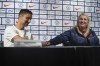 Head coaches of the United States men's and women's Olympic soccer teams, Marko Mitrovic and Emma Hayes, bump fists during a news conference in New York, Monday, July 8, 2024. (AP Photo/Seth Wenig)