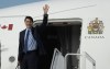 Prime Minister Justin Trudeau waves as he boards a government plane as he departs for the NATO Summit from the airport on July 8, 2024 in Ottawa. THE CANADIAN PRESS/Adrian Wyld