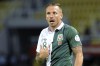FILE - Wales player Craig Bellamy reacts during a World Cup 2014 Group A qualifying soccer match against Macedonia, at Philip II arena in Skopje, Macedonia, on Sept. 6, 2013. Former Wales captain Craig Bellamy was hired to coach the national team on a contract until 2028 on Tuesday. (AP Photo/Boris Grdanoski, File)