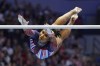 Jordan Chiles competes on the uneven bars at the United States Gymnastics Olympic Trials on Sunday, June 30, 2024, in Minneapolis. (AP Photo/Abbie Parr)