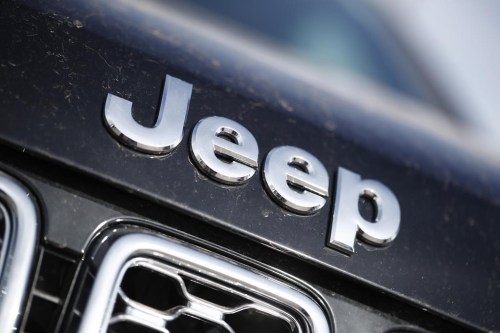 FILE - The Jeep logo is shown in the south Denver suburb of Englewood, Colo., on April 15, 2018. On Friday, July 5, 2024, the National Highway Traffic Safety Administration announced an investigation into a potential “loss of motive power” in more than 94,000 Jeep Wranglers. (AP Photo/David Zalubowski)