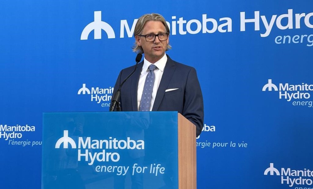 Allan Danroth, Manitoba Hydro's new president and chief executive officer, speaks in Winnipeg on Tuesday, July 9, 2024. THE CANADIAN PRESS/Steve Lambert