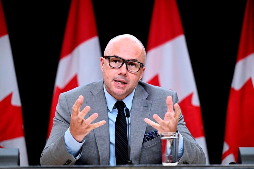 Alex Benay, Associate Deputy Minister at Public Services and Procurement Canada, speaks about the work to standardize and simplify HR and pay practices across the public service, during a news conference at the National Press Theatre in Ottawa, on Tuesday, July 9, 2024. THE CANADIAN PRESS/Justin Tang
