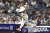 Boston Red Sox third baseman Rafael Devers throws out New York Yankees' DJ LeMahieu at first base during the eighth inning of a baseball game, Sunday, July 7, 2024, in New York. (AP Photo/Noah K. Murray)