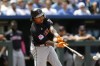 Cleveland Guardians' Jose Ramirez hits an RBI double during the eighth inning of a baseball game against the Kansas City Royals in Kansas City, Mo., Sunday, June 30, 2024. (AP Photo/Colin E. Braley)