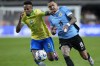 Brazil's Eder Militao, left, and Uruguay's Darwin Nunez fight for the ball during a Copa America quarterfinal soccer match in Las Vegas, Saturday, July 6, 2024. (AP Photo/Godofredo A. Vásquez)