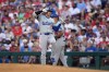 Los Angeles Dodgers' Shohei Ohtani reacts after hitting a single against Philadelphia Phillies pitcher Zack Wheeler during the third inning of a baseball game, Tuesday, July 9, 2024, in Philadelphia. (AP Photo/Matt Slocum)