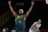 FILE - Australia's Patty Mills (5) reacts as time runs down against Slovenia during the men's bronze medal basketball game at the 2020 Summer Olympics, Saturday, Aug. 7, 2021, in Tokyo, Japan. The Australian Olympic team said their team is also likely to be the third-largest delegation at the Paris Olympics — despite its relatively small population of 26 million. Ten Indigenous athletes will also represent Australia with NBA star Patty Mills the first five-time Indigenous Olympian. (AP Photo/Eric Gay, File)