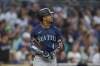 Seattle Mariners' Julio Rodriguez watches his home run during the fifth inning of a baseball game against the San Diego Padres, Tuesday, July 9, 2024, in San Diego. (AP Photo/Gregory Bull)