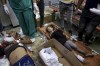 Palestinians wounded in the Israeli bombardment of the Gaza Strip are treated in a hospital in Khan Younis, Tuesday, July 9, 2024. (AP Photo/Jehad Alshrafi)