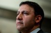 The administrative wing of the Prime Minister's Office says it has issued new direction in terms of how federal appointees are screened following concerns officials failed to search posts made by the incoming human rights chief. Justice Minister Arif Virani speaks in the foyer of the House of Commons on Parliament Hill in Ottawa, on Monday, May 6, 2024. THE CANADIAN PRESS/Spencer Colby