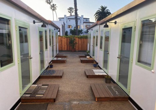 This image courtesy of Dignity Moves shows the tiny homes community in downtown Santa Barbara, Calif., photographed in 2022. Dignity Moves and the County of Santa Barbara partnered on this interim supportive housing community, consisting of 34 private rooms with shared community spaces and access to county services. (Dignity Moves via AP)